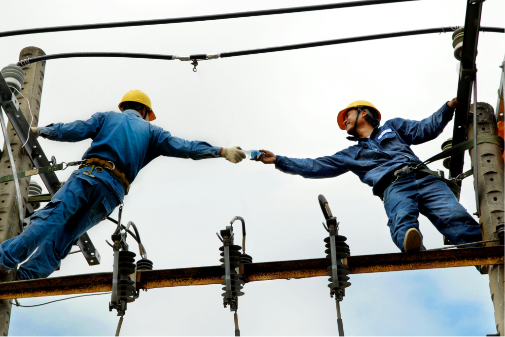 Two workers on a power lines